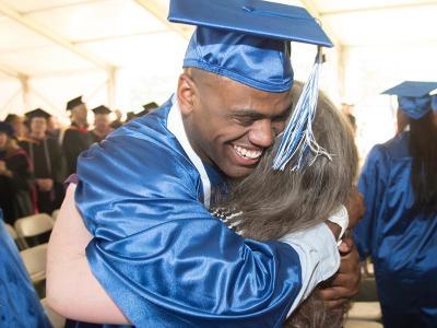 graduate hug